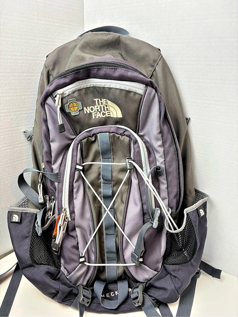 The North Face Heckler Backpack in Army Green & Gray